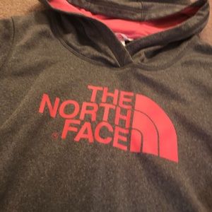 Woman’s NorthFace sweatshirt